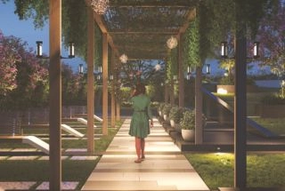 Elegant living room with blue ottoman